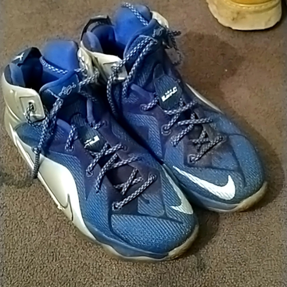 Boys blue Nike shoes